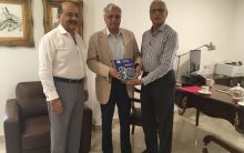 President Trust presenting the Trust Annual Report to Secretary General PTI
